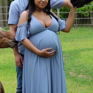 Blue wrap-around dress or gown.